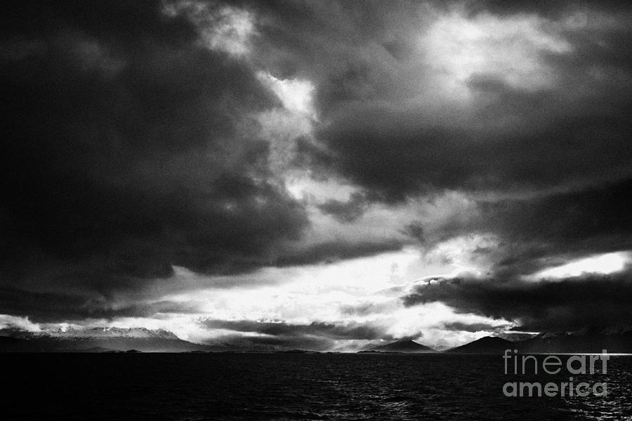 Space Photograph - dark clouds over the Beagle Channel and Isla Navarino Tierra Del Fuego Chile and Argentina by Joe Fox