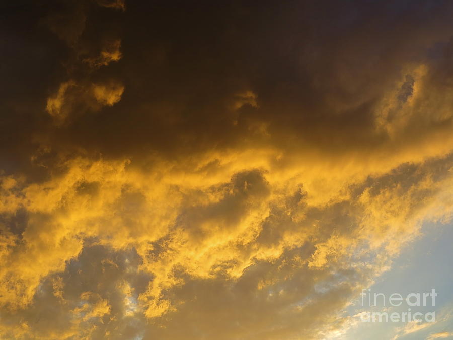 Dark Golden Clouds at Sunset. Photograph by Robert Birkenes