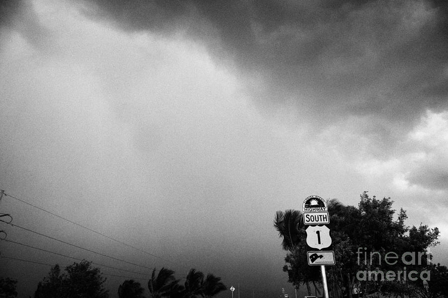 Key Photograph - Dark Rain Storm Clouds Blow Over The Seven-mile Bridge Marathon Key Florida Keys Usa by Joe Fox
