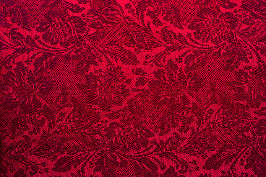 Dark red textile wallpaper on the wall Photograph by Crossbrain66