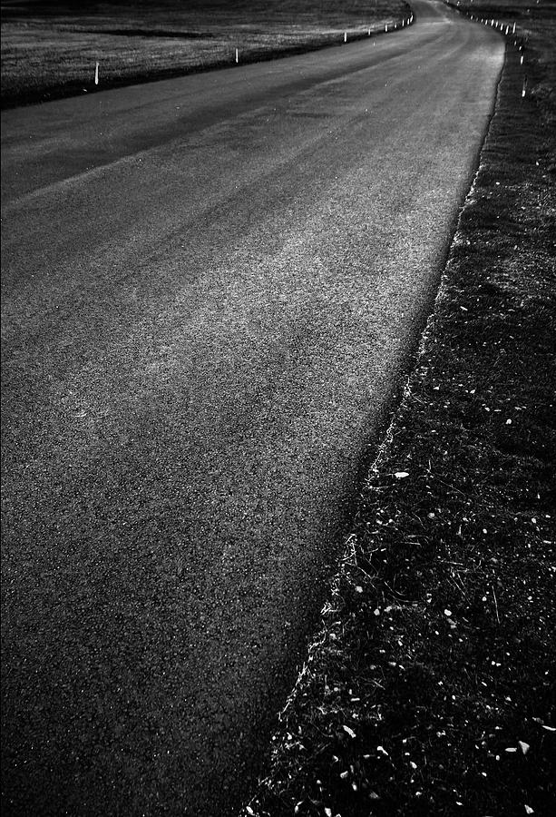 Dark shiny road Photograph by Arkady Kunysz