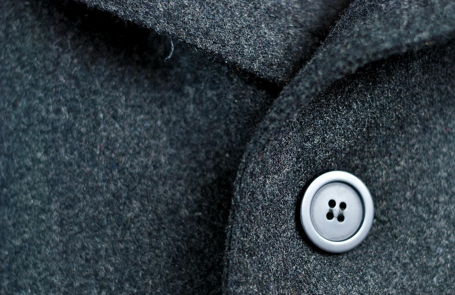 Dark wool coat with one black button Photograph by Mgov