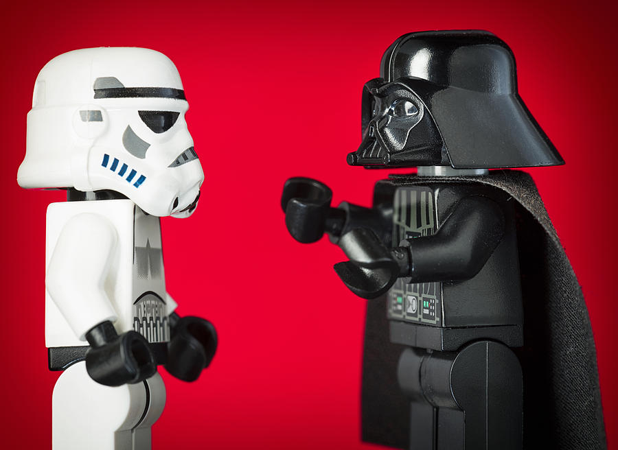 Darth Vader Lego Figurine Commanding a Stormtrooper Photograph by Georgeclerk