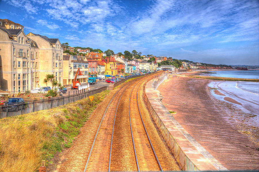 Dawlish Devon England with beach railway track and sea on blue sky ...