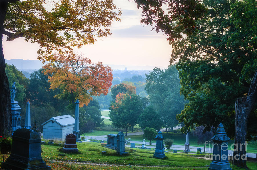 Dawn at Woodlawn with Gravestones Photograph by Kari Yearous