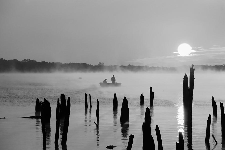 Dawn Fisherman bw Photograph by Roger Becker