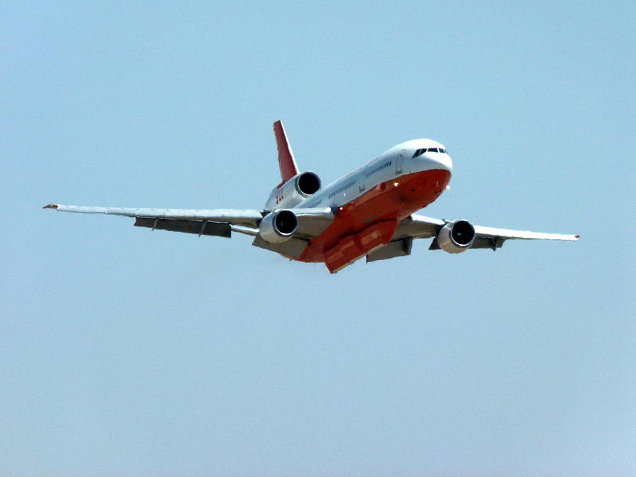 DC10 Air Tanker Flying Photograph by Jeff Lowe