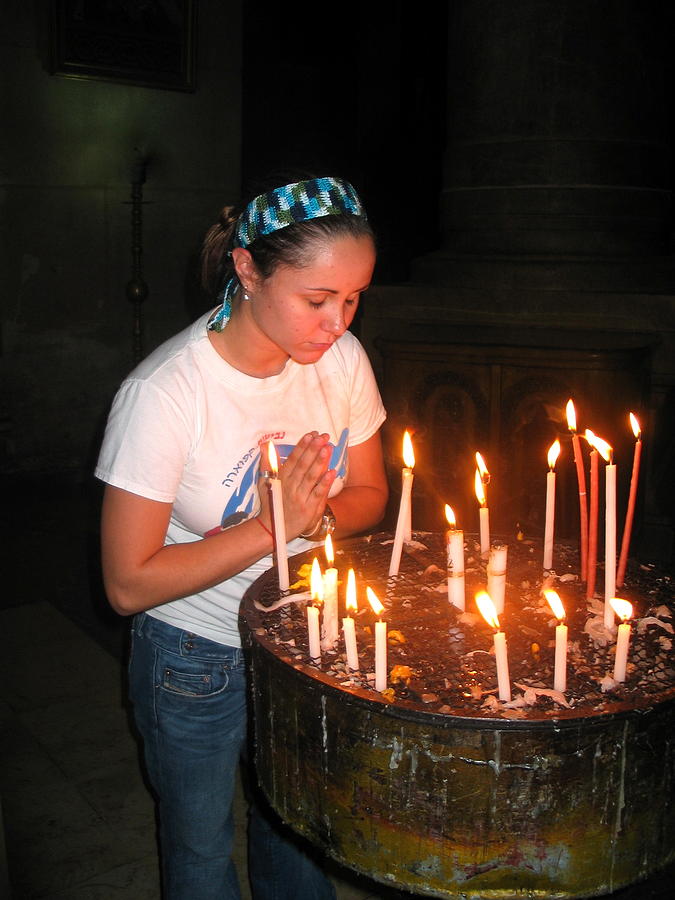 Deborah praying at the Church of the Holy Sepulchre in Jerusalem Photograph by Rita Adams