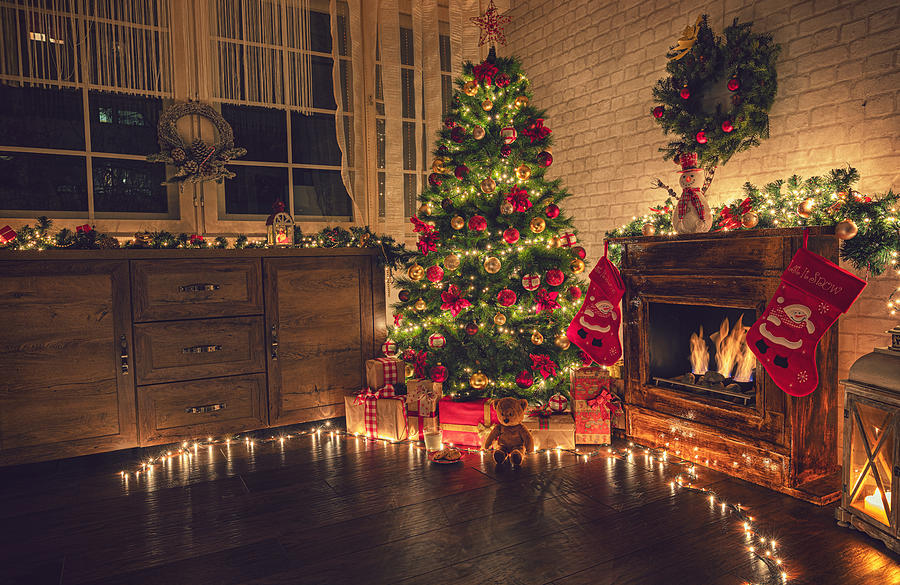 Decorated Christmas Tree Near Fireplace at Home Photograph by Kajakiki