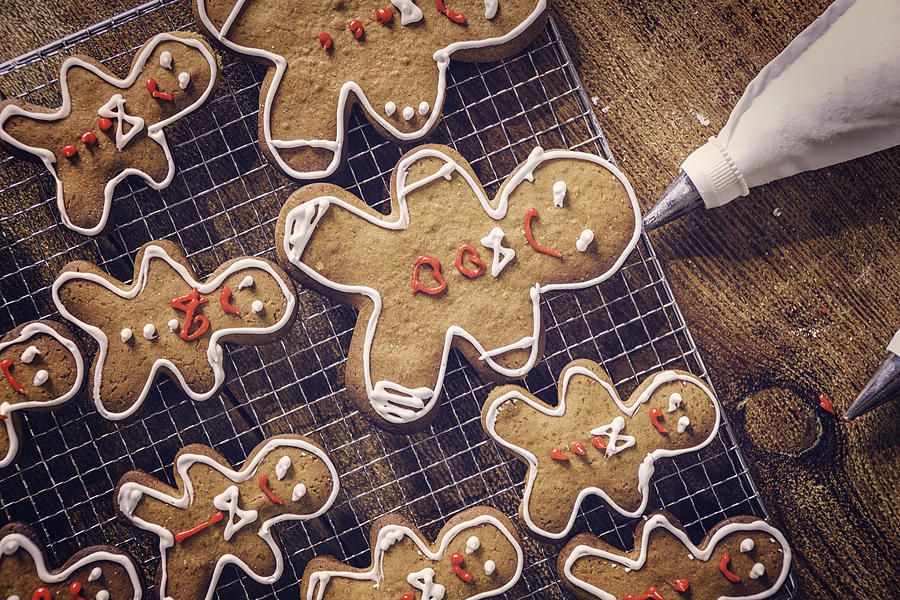 Decorating Christmas Cookies with Icing Photograph by GMVozd