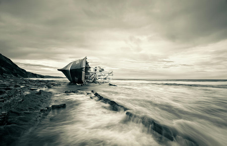 Fall Photograph - Defeated By The Sea by I?igo Barandiaran
