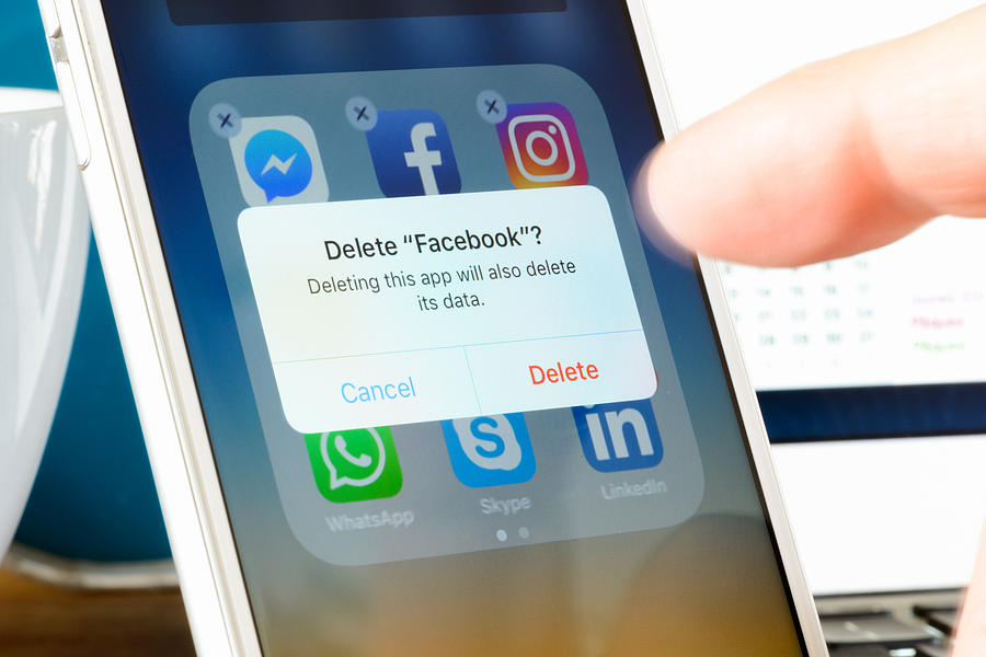 Deleting Facebook App from Smartphone Photograph by Amesy