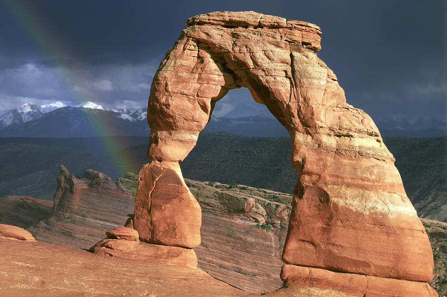 Delicate Arch And Rainbow Photograph
