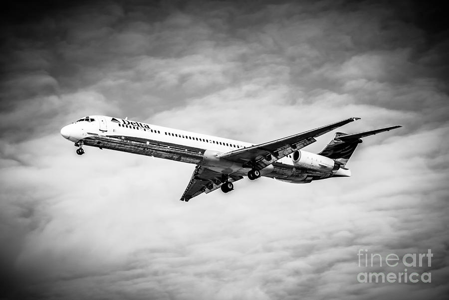 Delta Air Lines Airplane in Black and White Photograph by Paul Velgos