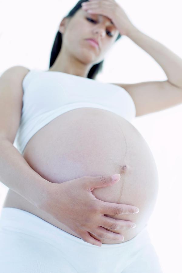 Adult Photograph - Depressed Pregnant Woman by Ian Hooton/science Photo Library