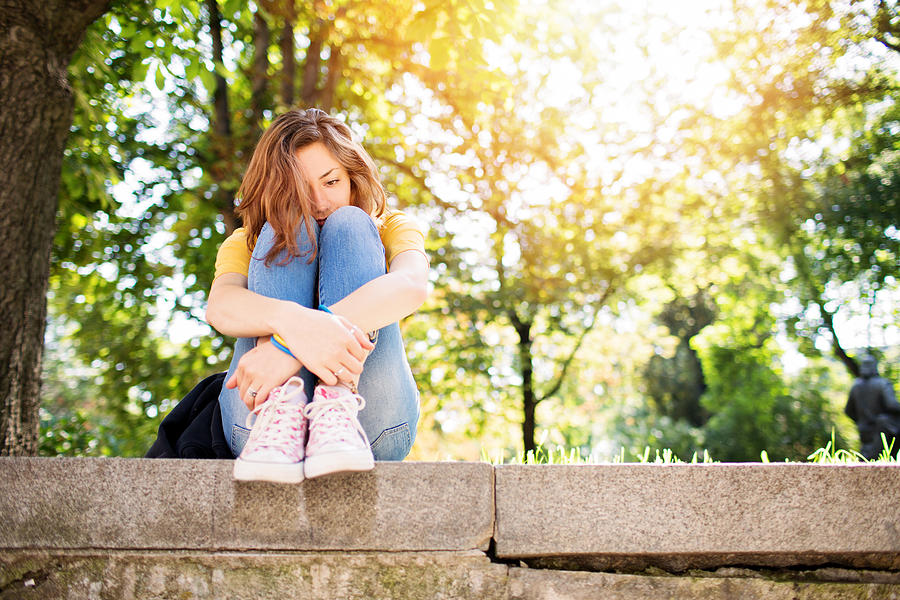Depressed teenage girl Photograph by Martin-dm