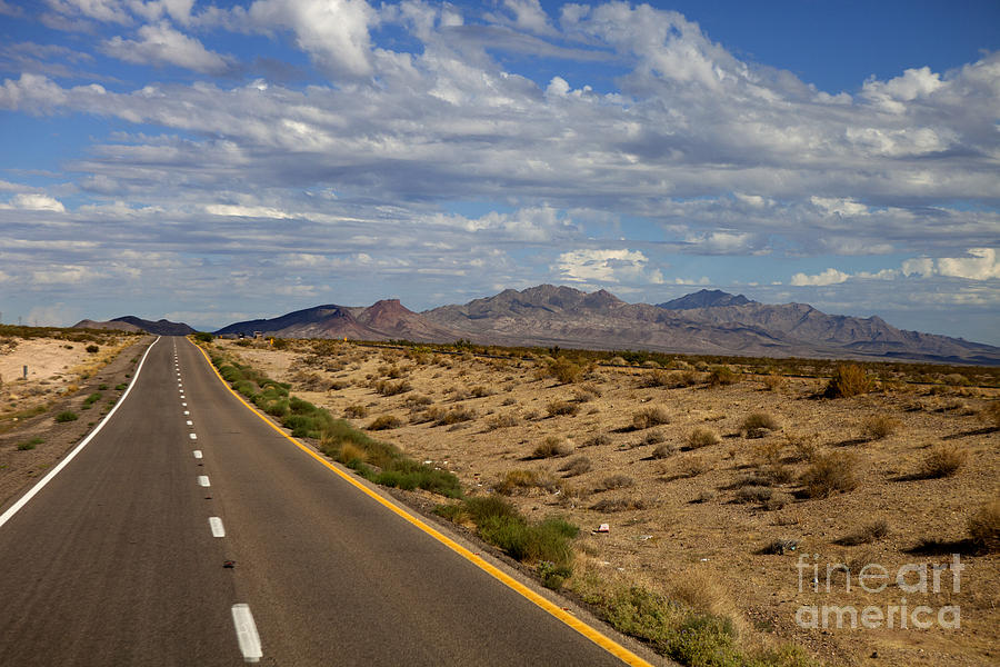 Desert Highway Photograph by Anthony Totah