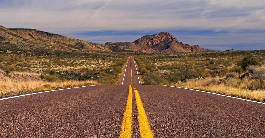 Desert highway near Kirkland Peak Arizona Photograph by Daniel Woodrum