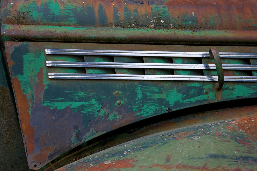 Abstract Photograph - Detail Of An Abandoned Chevy Truck by Mallorie Ostrowitz