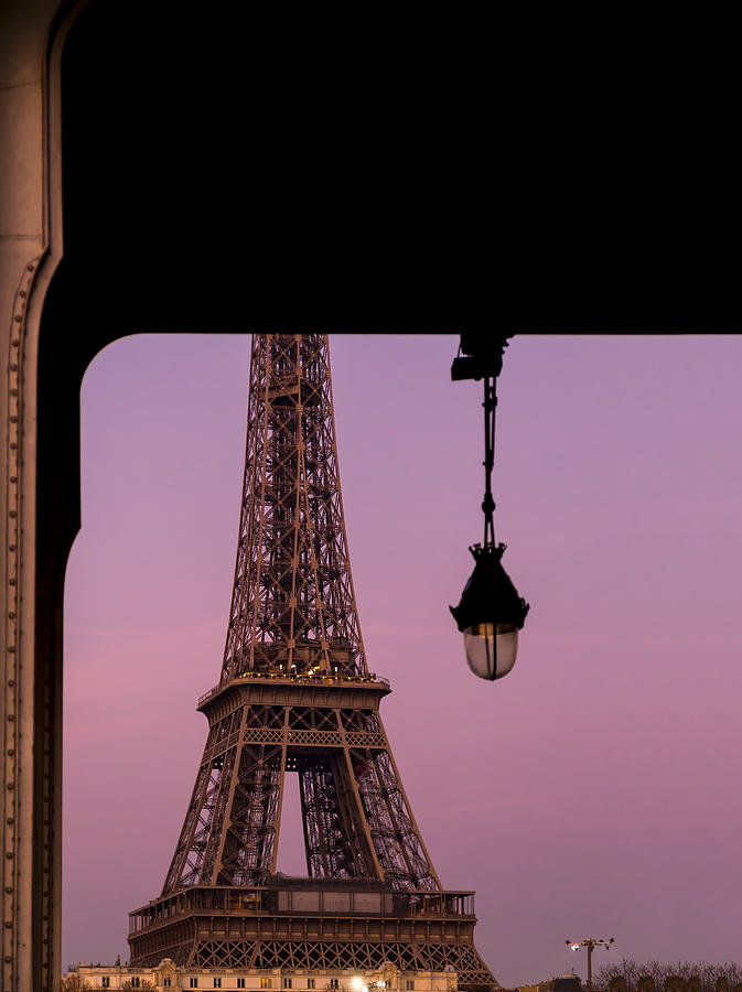Architecture Photograph - Detail of the Eiffel Tower Visible from Under a Bridge by Francesco Rizzato
