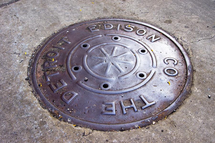 Detroit Edison Manhole Cover Photograph by Mark Williamson/science Photo Library