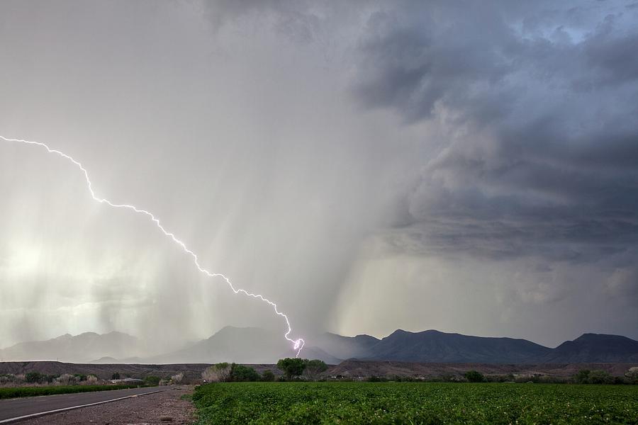 Diagonal Lightning Strike Photograph by Roger Hill