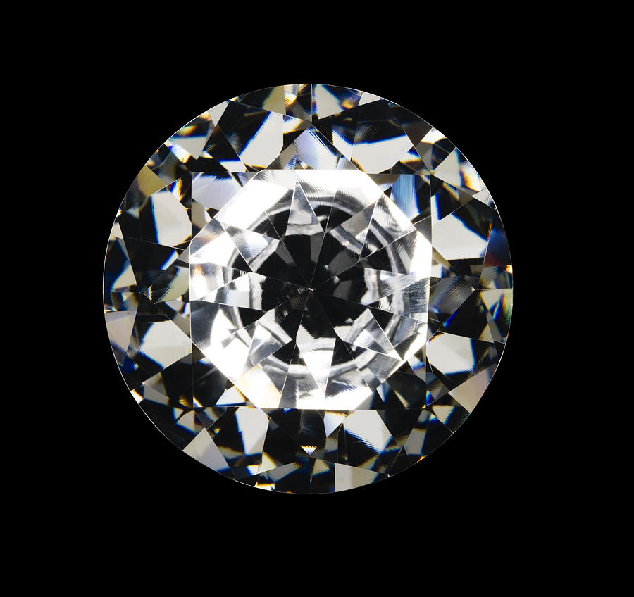 Diamond on black background, overhead view Photograph by Will Woods