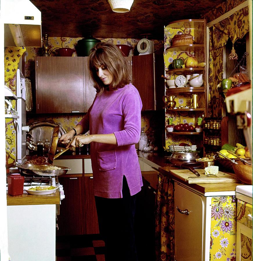 London Photograph - Diana Phipps Cooking At Home by Henry Clarke