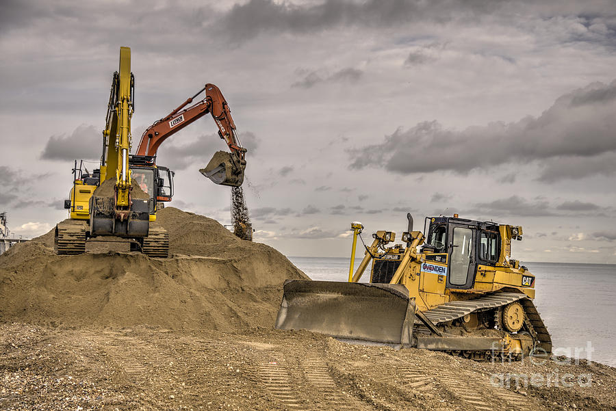 Beach Photograph - Digging and dozing by Rob Hawkins