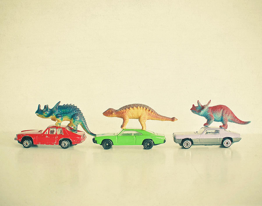 Toy Dinosaurs Photograph - Dinosaurs Ride Cars by Cassia Beck