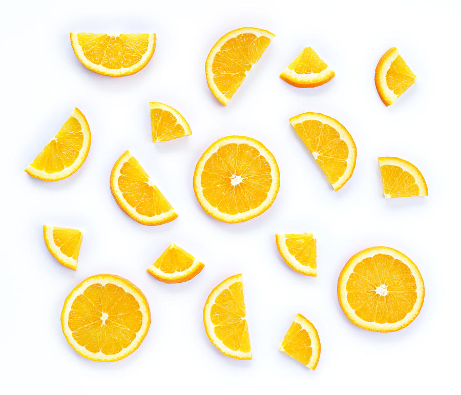 Directly Above Shot Of Orange Slices On White Background Photograph by Poh Kim Yeoh / EyeEm