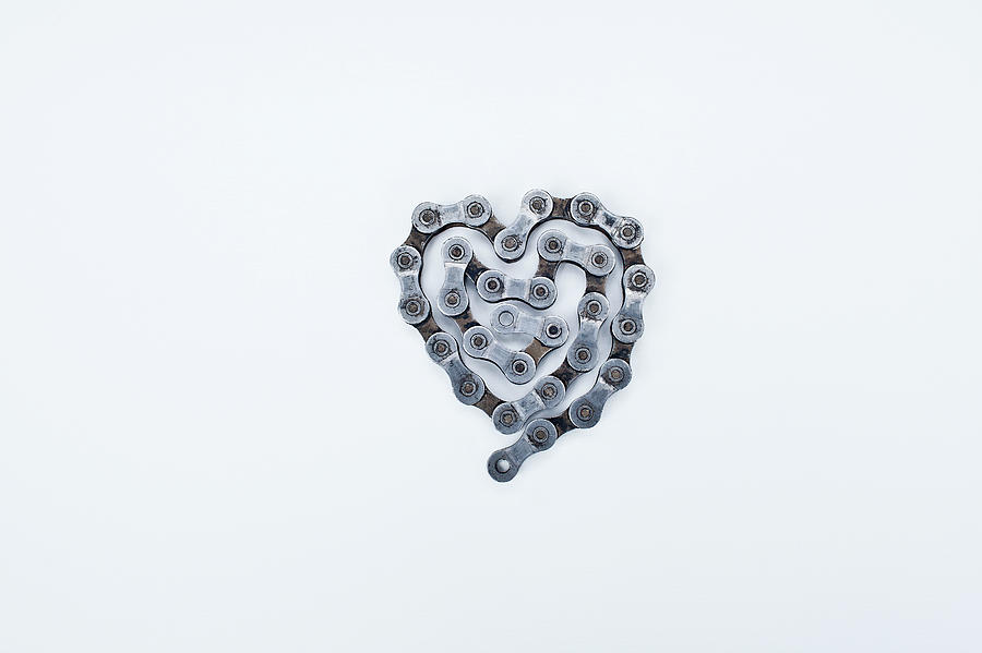 Dirty Bicycle Chain Shaped As A Heart Photograph by Noah Clayton