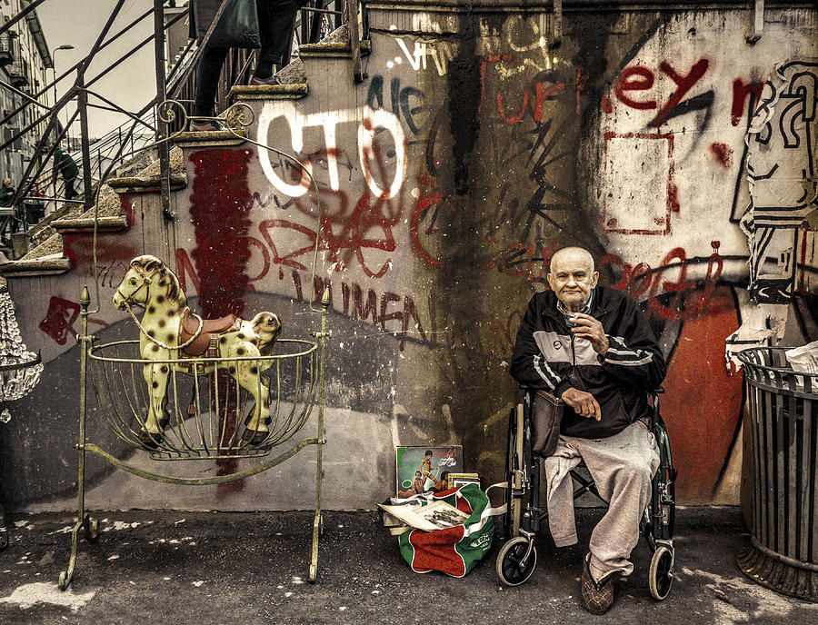 Disabled person and rocking horse Photograph by Roberto Pagani