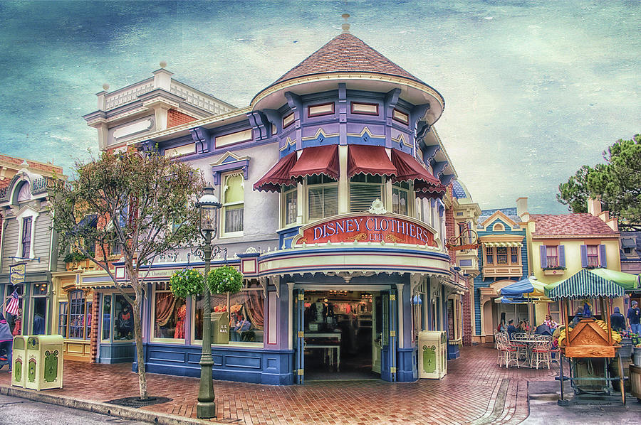 Disney Clothiers Main Street Disneyland Textured Sky Photograph by Thomas Woolworth