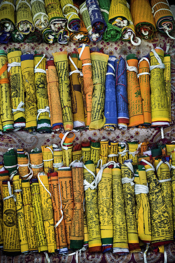 Display Of Rolled-up Prayer Flags Photograph by Glen Allison