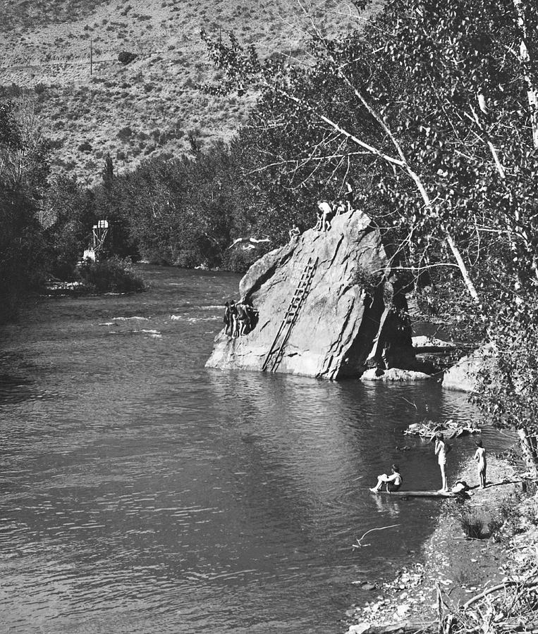 Diving At The Swimming Hole Photograph by Underwood Archives