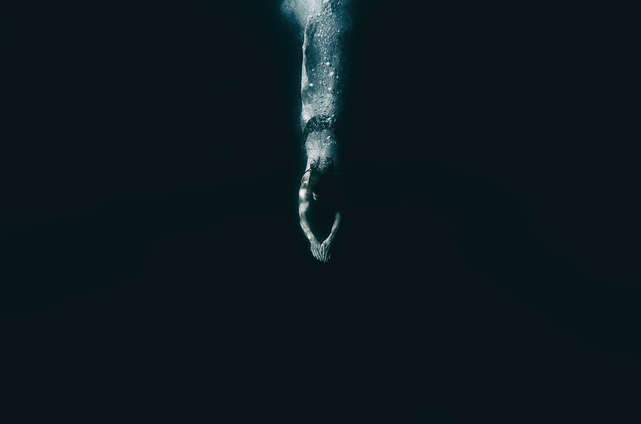Diving into dark water, unknown, future Photograph by Vernonwiley