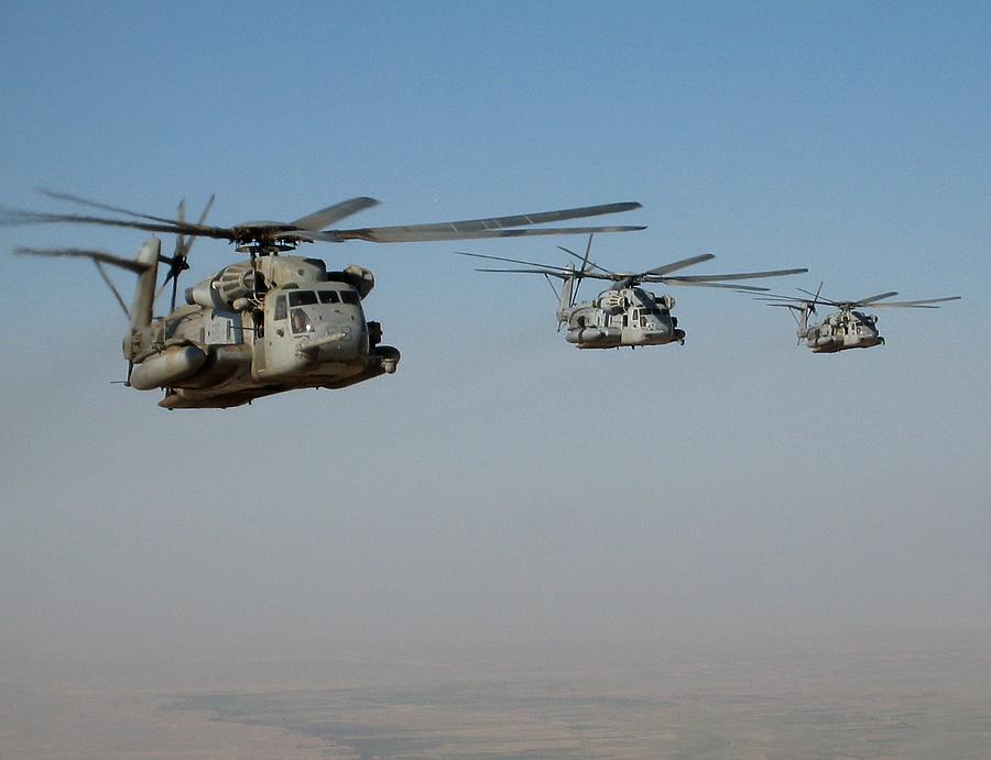 Division of CH-53 flying in Afghanistan Photograph by Jetson Nguyen