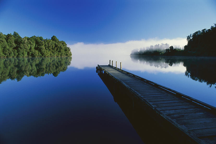 Dock On Lake Mapourika Photograph by Andy Reisinger