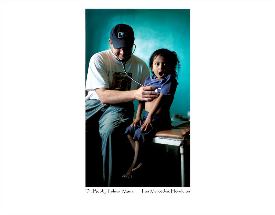 Doctor Examines Honduran Girl Photograph by Tina Manley