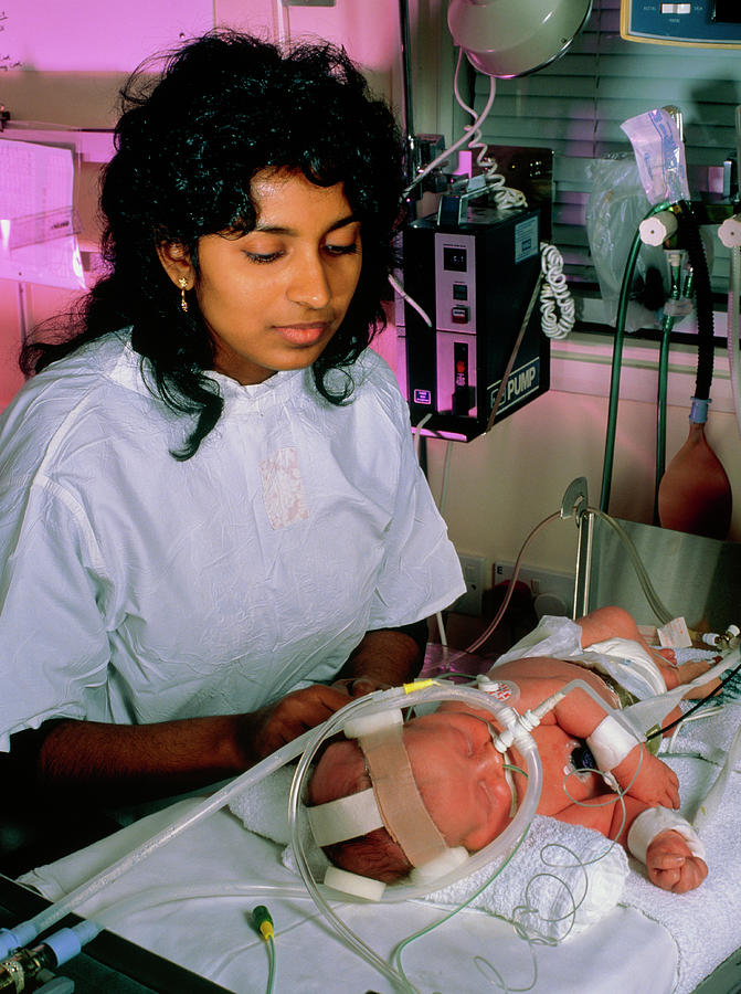 Colostomy Photograph - Doctor Examining A Newborn Baby In Intensive Care by Simon Fraser/department Of Child Health, Rvi, Newcastle/science Photo Library
