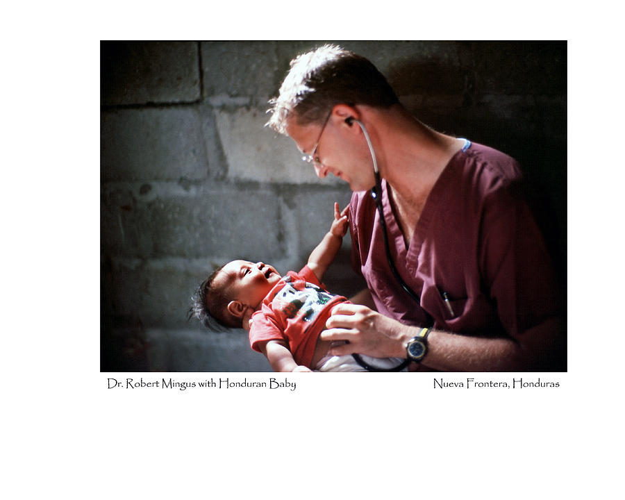 Doctor with Honduran Baby Photograph by Tina Manley