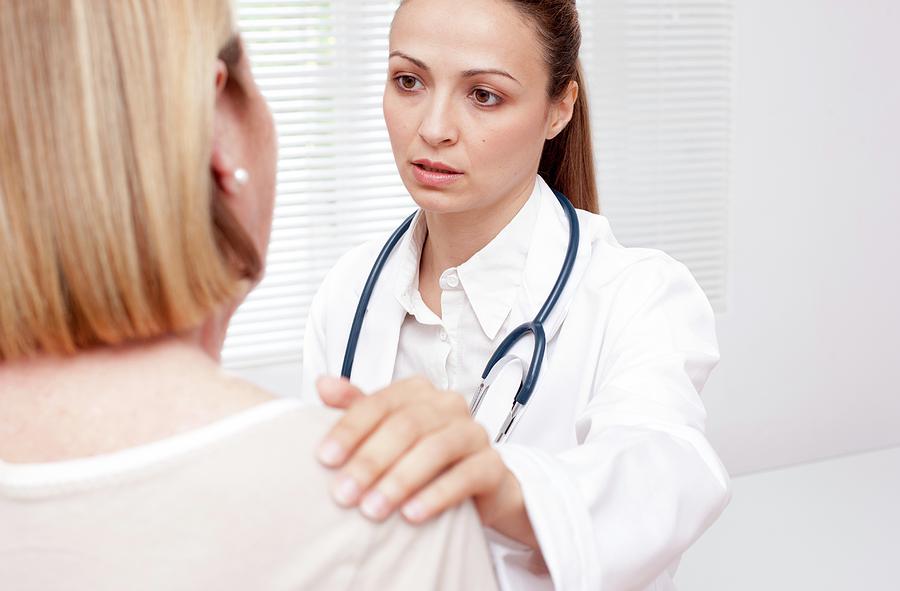 Doctor With Senior Patient by Science Photo Library