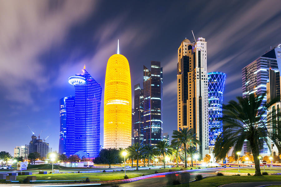 Doha city center illuminated at night, Qatar, Middle East Photograph by Matteo Colombo