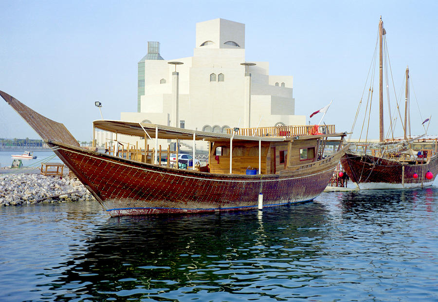 Doha dhows and Islamic Art Museum Photograph by Paul Cowan