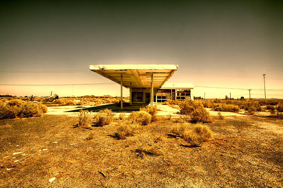 Architecture Photograph - Dollar Twenty Five a Gallon by Peter Tellone
