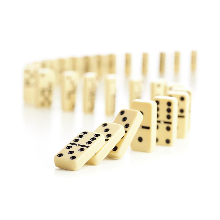 Dominoes Falling Down Photograph by Science Photo Library