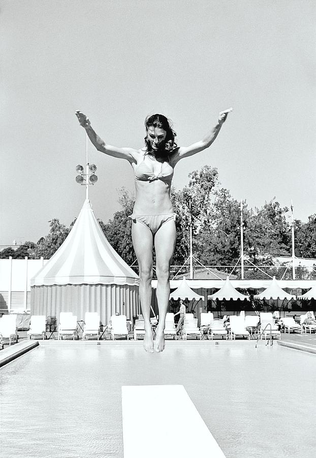 Donna Garrett Jumping On Diving Board Photograph by William Connors Donna Garrett Jumping On Diving Board Photograph by William Connors