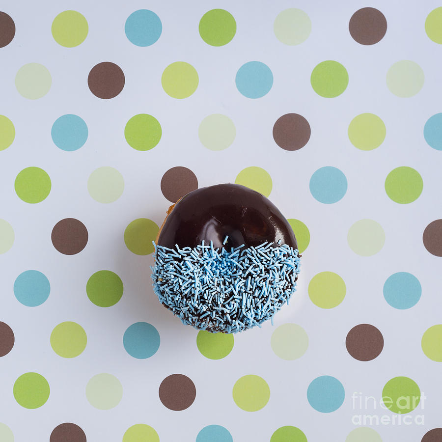 Donut Photograph - Donut With Chocolate Icing And Blue Sprinkles On Dotty Backgroun by Gillian Vann