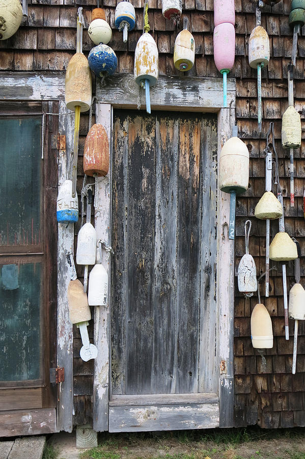 Door and Buoys Photograph by Jean Macaluso